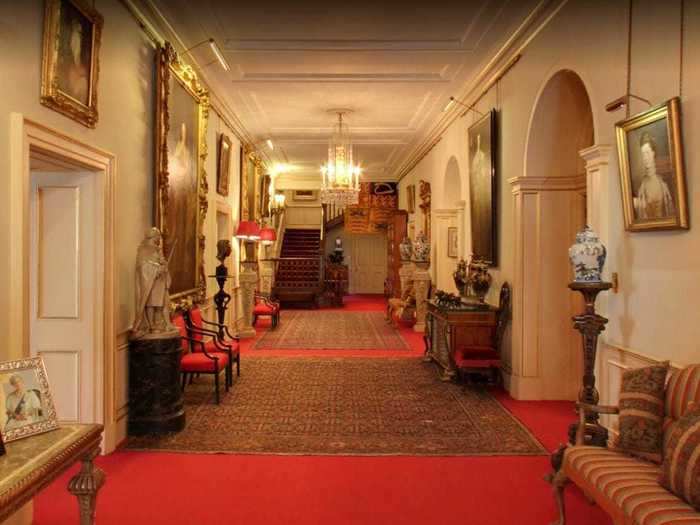 The Entrance Hall to the home seems like a gallery of paintings and relics of the royal family.