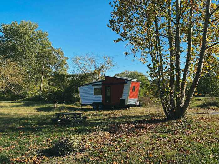 The home was designed to be "durable, versatile, and super energy efficient" with elements like sloped walls, solar systems, and a bed that can be electronically lifted.