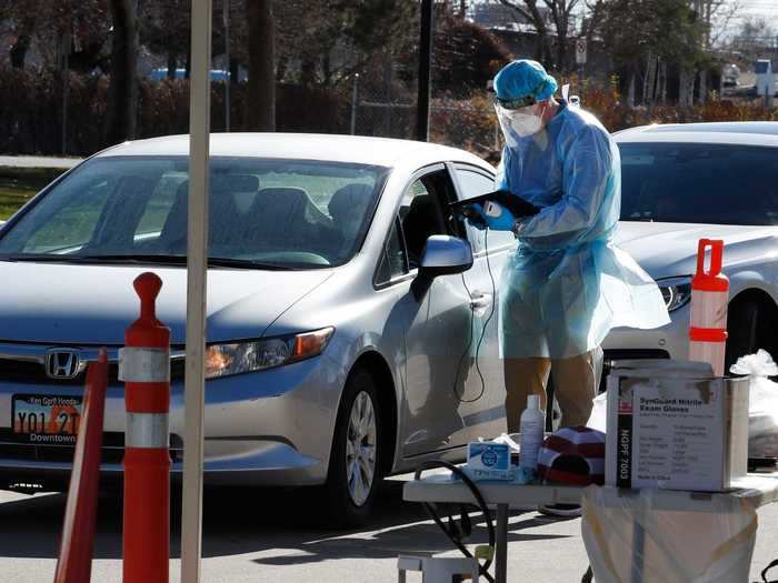 Members of the Utah National Guard gave COVID-19 swab tests to people in their cars at the Utah County Health Department on November 20, 2020, in Salt Lake City, Utah.