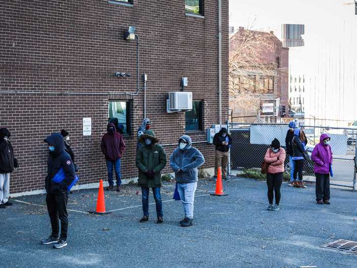 People waited in long lines in Boston, despite temperatures in the 30s.