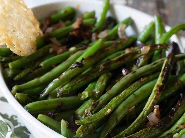 You can use the same stovetop green bean recipe when making them in a slow cooker.