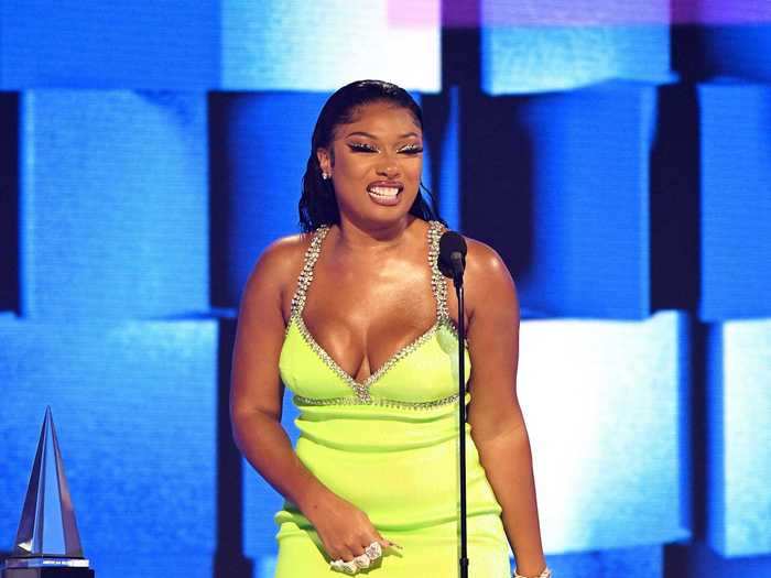 Megan Thee Stallion made a statement onstage in a neon-green dress.