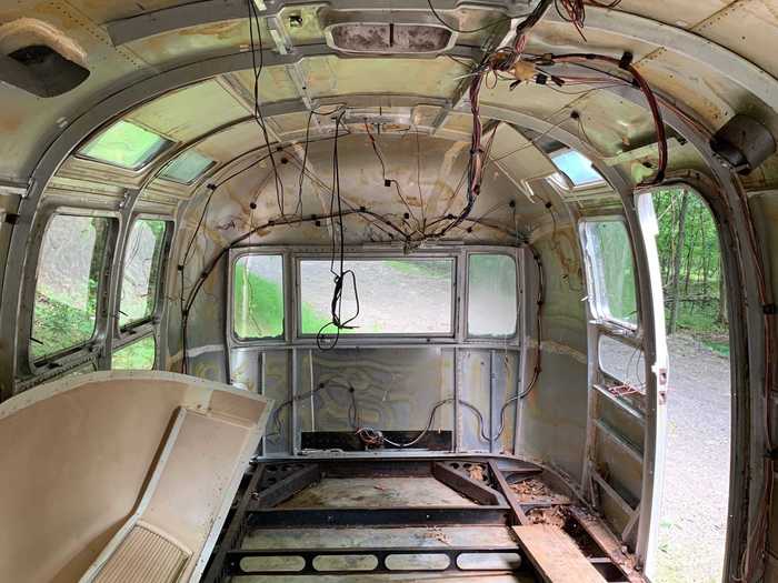 Name chosen, Amy and Ed got to work gutting the interior, removing the plumbing, shelving, floor, and 50-year-old wiring and insulation.