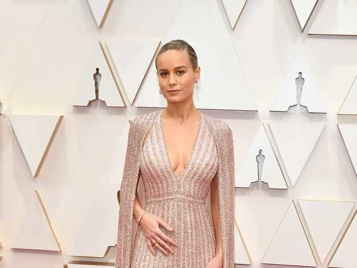 Brie Larson lit up the Oscars red carpet in a sparkling Celine dress with an attached cape.