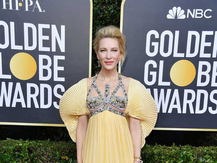 Cate Blanchett wore a unique gown with fan-style sleeves and a crystal-encrusted top.