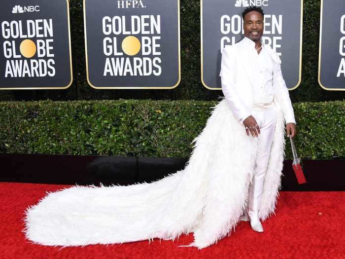 Billy Porter kicked off the year in a white suit with a glamorous train made from feathers.