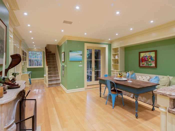 The kitchen is big enough to have its own dining table ...