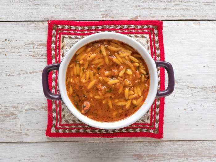 Use leftover sweet potatoes and turkey for a hearty orzo dish.