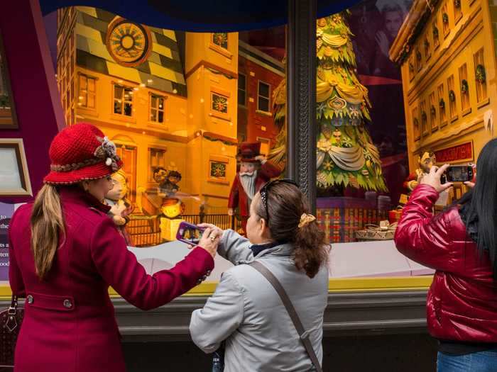 Today, department store holiday displays continue to dazzle passers-by.