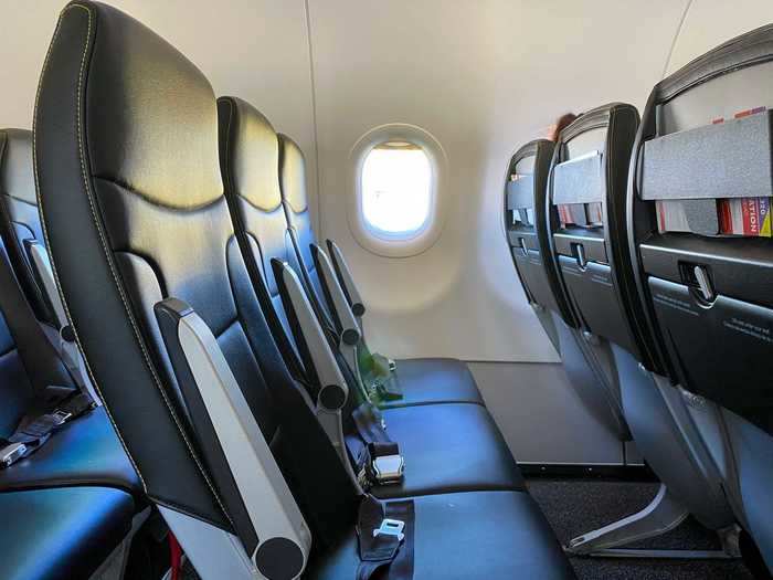 The plane was only a month old and it showed. The seats were impressively new, albeit slim.