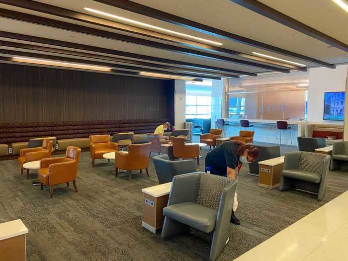 Lounge staff is tasked with cleaning seating areas as soon as a guest has left.