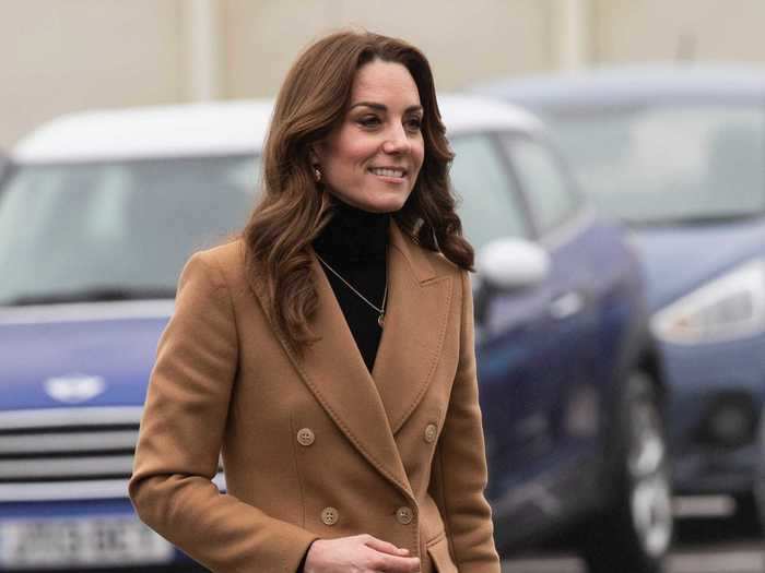 Middleton wore a leopard-print Zara skirt and a black turtleneck underneath her camel Massimo Dutti coat.