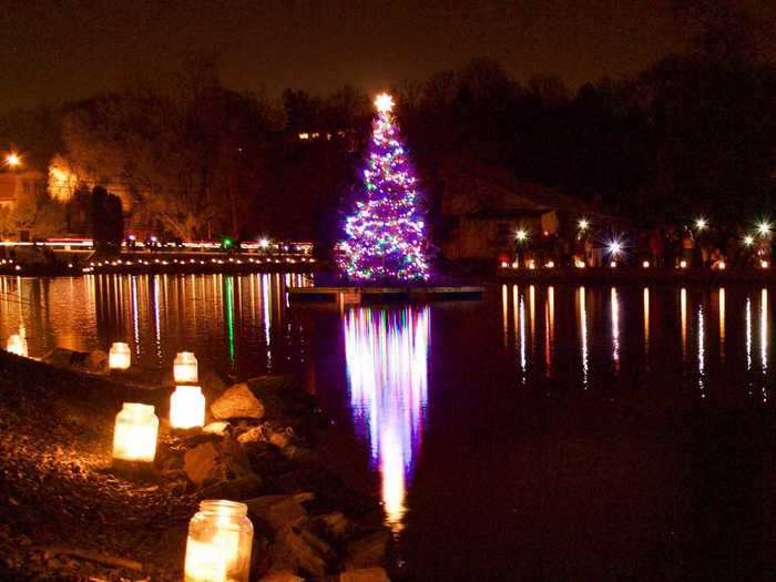 In Pennsylvania, Santa Claus ditches the sleigh and rows his way across a lake.