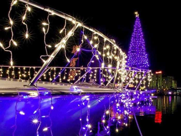 Decorated boats line the shores of Biloxi Beach for the largest Christmas boat parade in Mississippi.