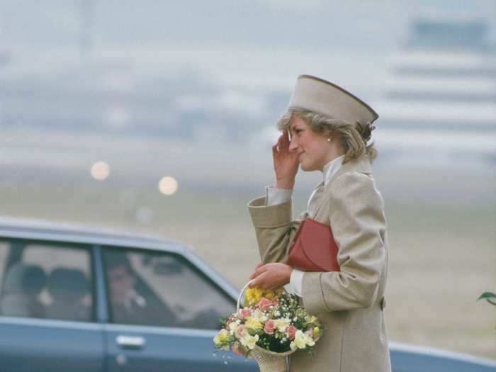 Princess Diana looked sophisticated in a beige Caroline Charles coat in February 1985.