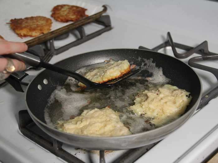 After mixing everything together, I scooped out half a cup of batter at a time into a pan of hot oil as the recipe instructed.