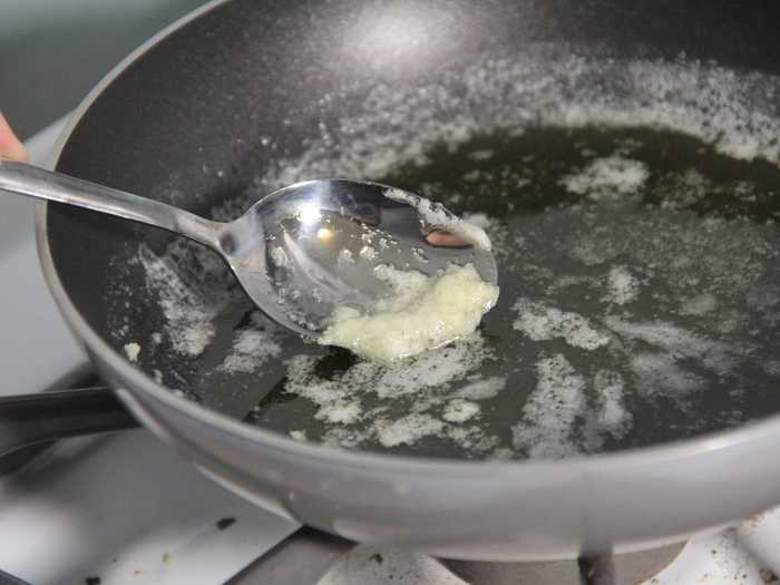 Making clarified butter involves melting butter, waiting for milk solids to settle, and skimming them off the top.