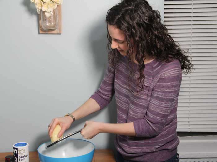 I began by peeling and grating the potatoes, then squeezing out the excess liquid.