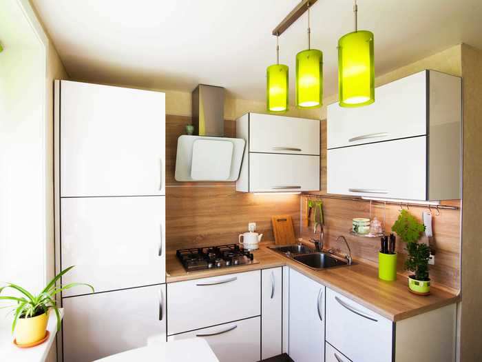 Installing high-gloss white cabinets can take away the warmth in a kitchen.