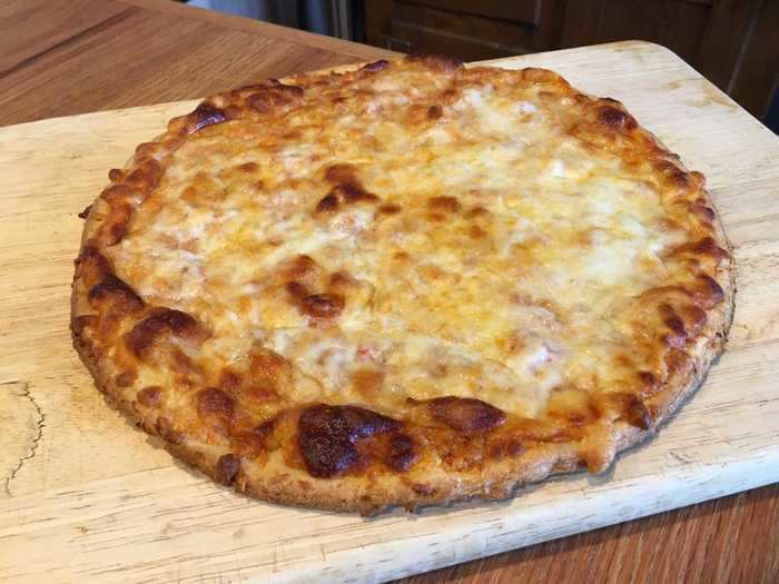 After just under 12 minutes, the cheese was hot and bubbly and the pizza was ready to be taken out of the oven.