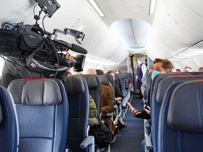 Second, a lot of the passengers were taking photos or filming TV segments — definitely a departure from the norm.