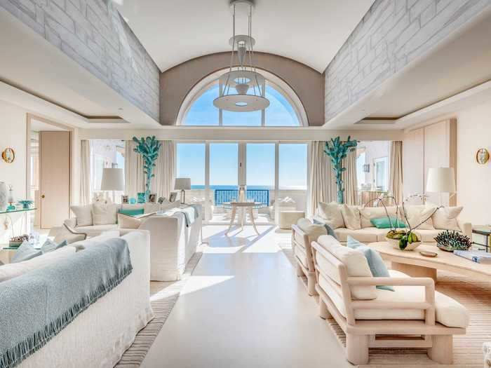 The Villa Del Mare penthouse spans 6,170 square feet and features 20-foot arched ceilings, according to the listing.