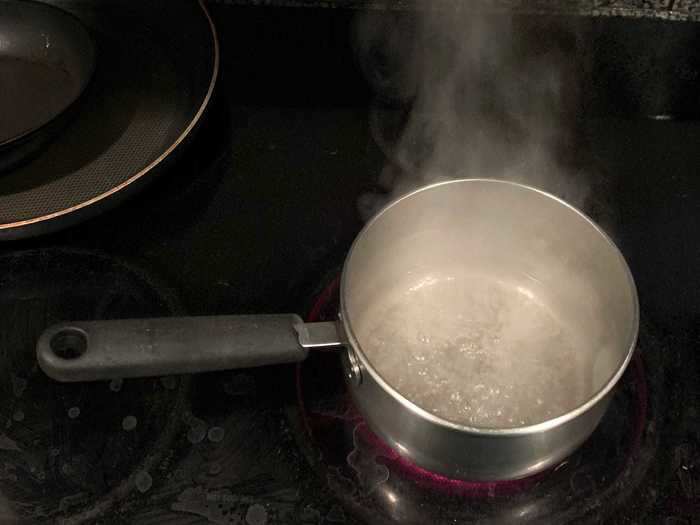 I poured my water and sugar into a saucepan over medium heat and brought it to a boil.