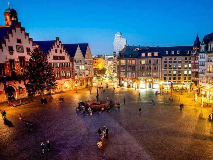 AFTER: But this year, the square has been left vacant and visitors can only view a single, large Christmas tree.