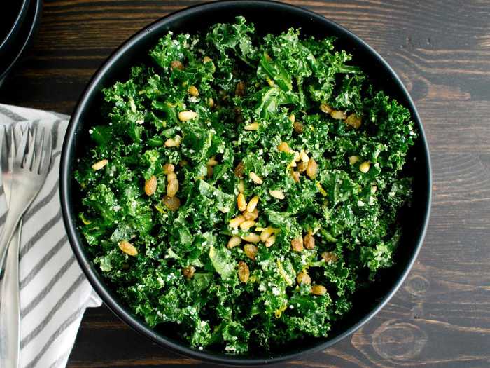 You can transform that extra kale in the fridge into a delicious salad with just a few simple ingredients.