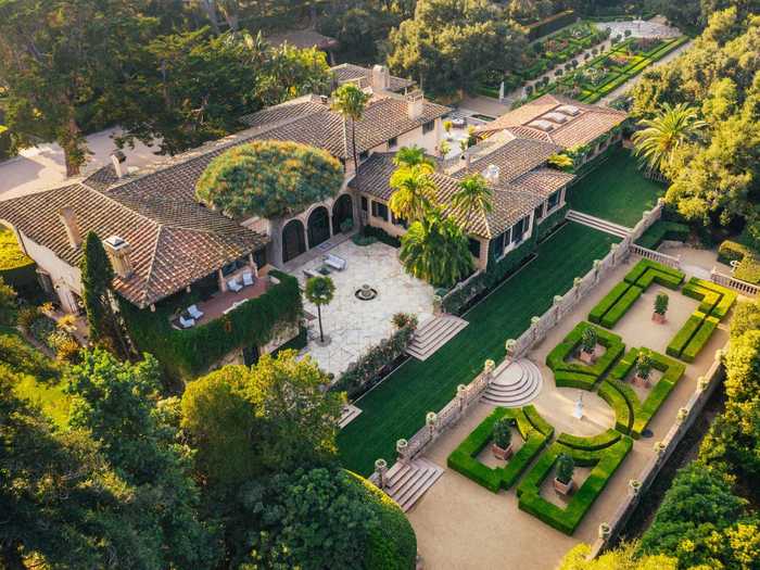 All the greenery makes the estate into a world of its own, separate from the rest of the wealthy neighborhood.