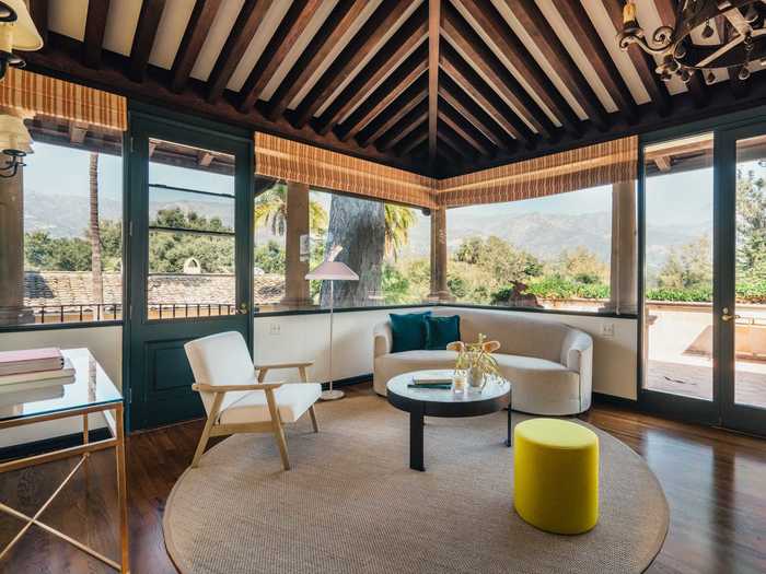 A solarium looks out onto the manicured property.