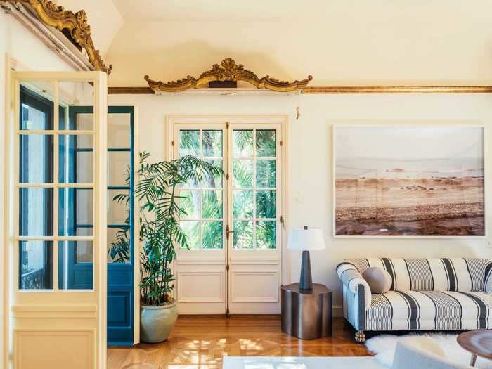 Detailing like gold accents and French doors continue throughout bedrooms and sitting rooms.