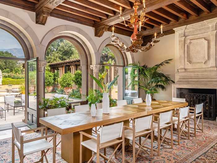 Arched limestone windows in the dining room were also preserved from the original architecture.