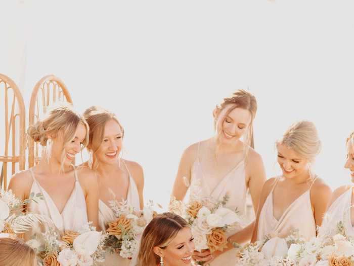 The bridesmaid dresses fit with the neutral color scheme of the wedding.