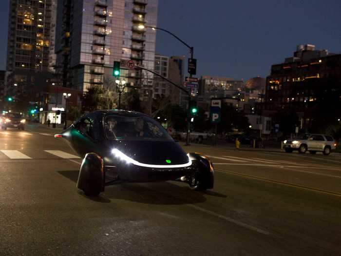 The three-wheeler is made of lightweight carbon fiber, kevlar, and hemp, and has an aerodynamic profile that looks like a small plane without the wings.