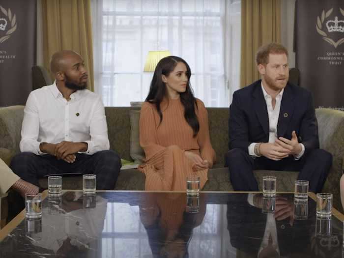 March: The Duchess of Sussex wore a $920 brown pleated Preen by Thornton Bregazzi dress with $87 Edge of Ember gold earrings for a virtual engagement.