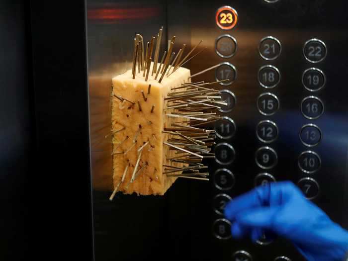 In India, a sponge full of toothpicks kept people from touching elevator buttons, per Reuters.