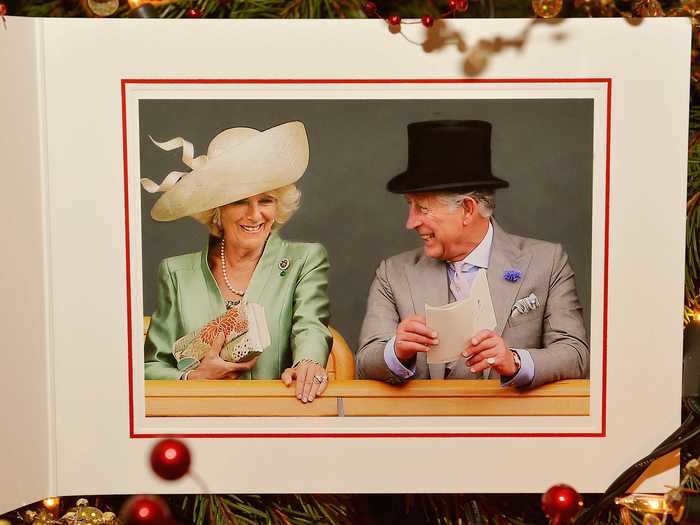 2013: Prince Charles and his wife share a joke in this photo on this Christmas card.