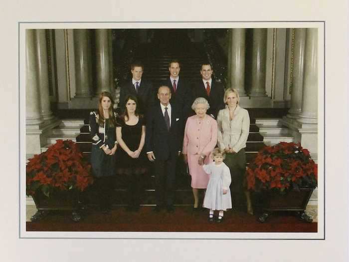 2007: The Queen and her husband shared two photos on their Christmas card this year. First, a photo of the couple with their grandchildren.