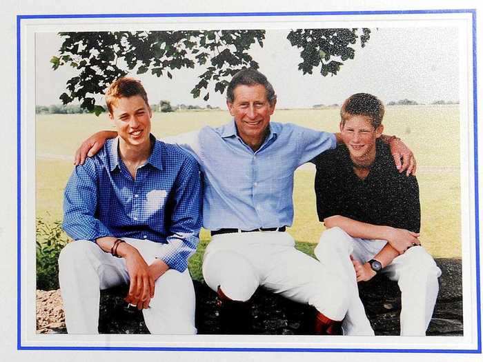 1999: Prince Charles put his arms around his sons in this photo on the front of his 1999 Christmas card.