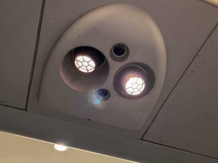 Above the seats were personal reading lights, much like on a plane, but no air vent.