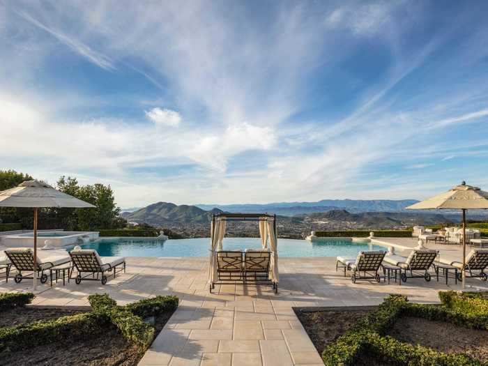 The infinity pool overlooks the Hidden Valley hills and cities below.