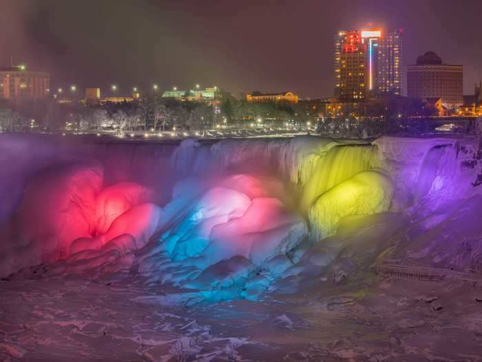 Nighttime offers a completely different view of the snowy falls.