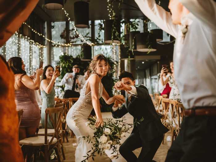 Catch the bride and groom breaking it down at their wedding in Phuket, Thailand.