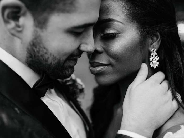 This up-close photo taken in New Orleans, Louisiana, captures a serene moment between the bride and groom.