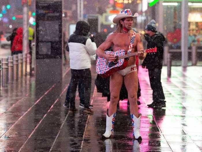 It was chilly, but certainly not cold enough to keep Naked Cowboy inside