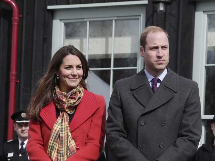 He paired a charcoal grey jacket with a purple tie for another smart winter look in March 2013.