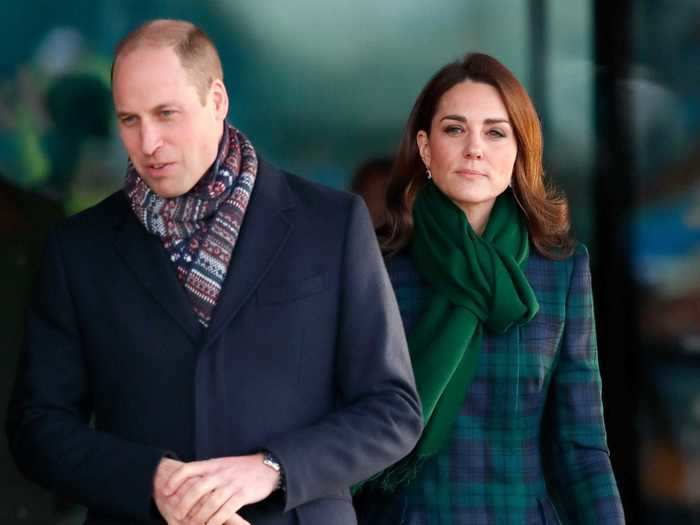 While Kate Middleton wore another classic tartan coat, Prince William dressed up his navy jacket with a patterned scarf.