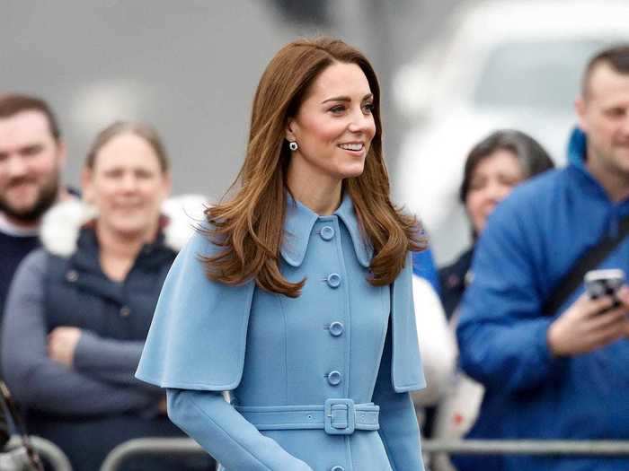 Middleton looked chic in a periwinkle Mulberry coat with a pair of navy heels while visiting Northern Ireland in February 2019.