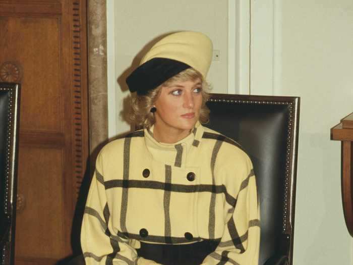 Princess Diana wore this trendy yellow and black outfit by Escada in November 1987.